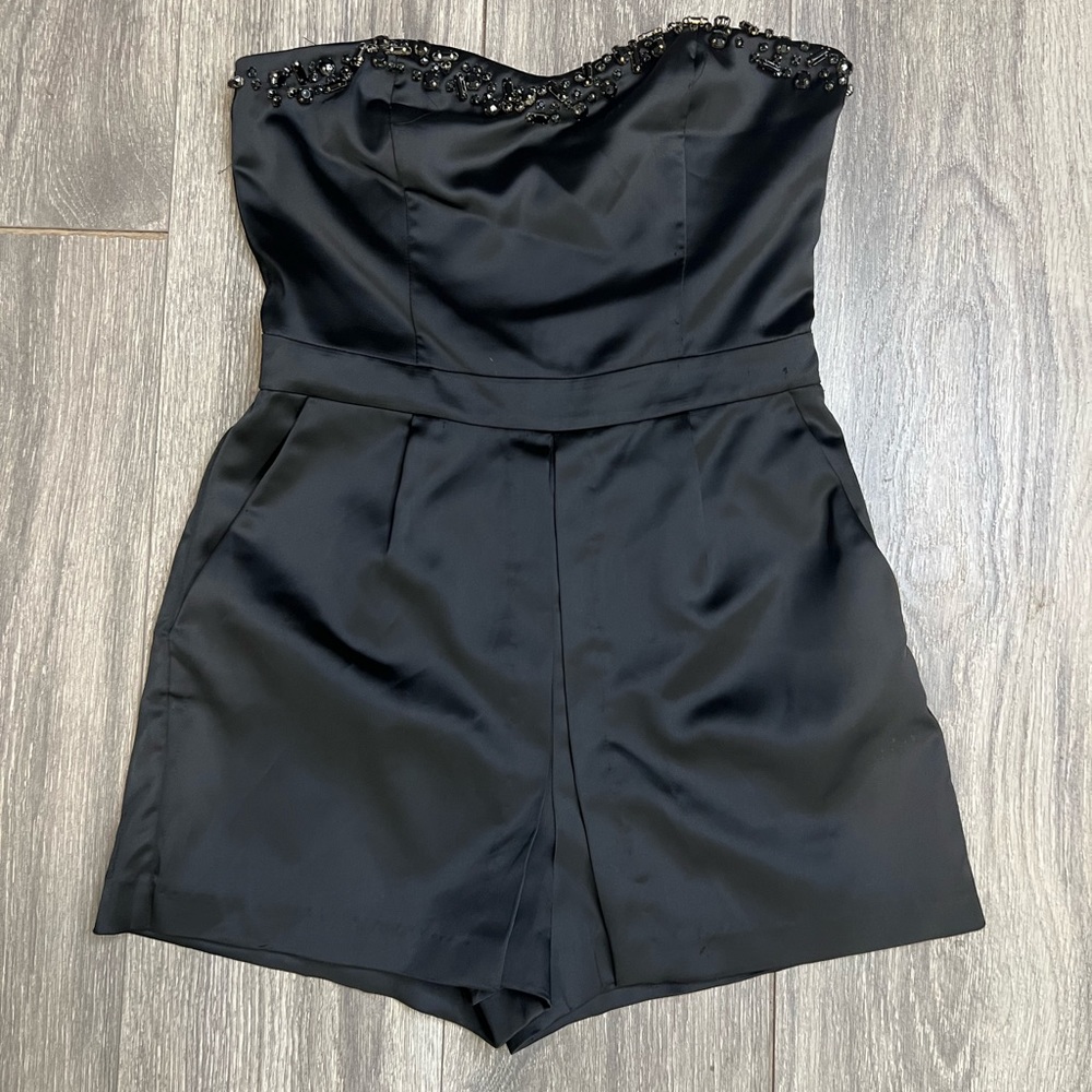 Silky black strapless romper